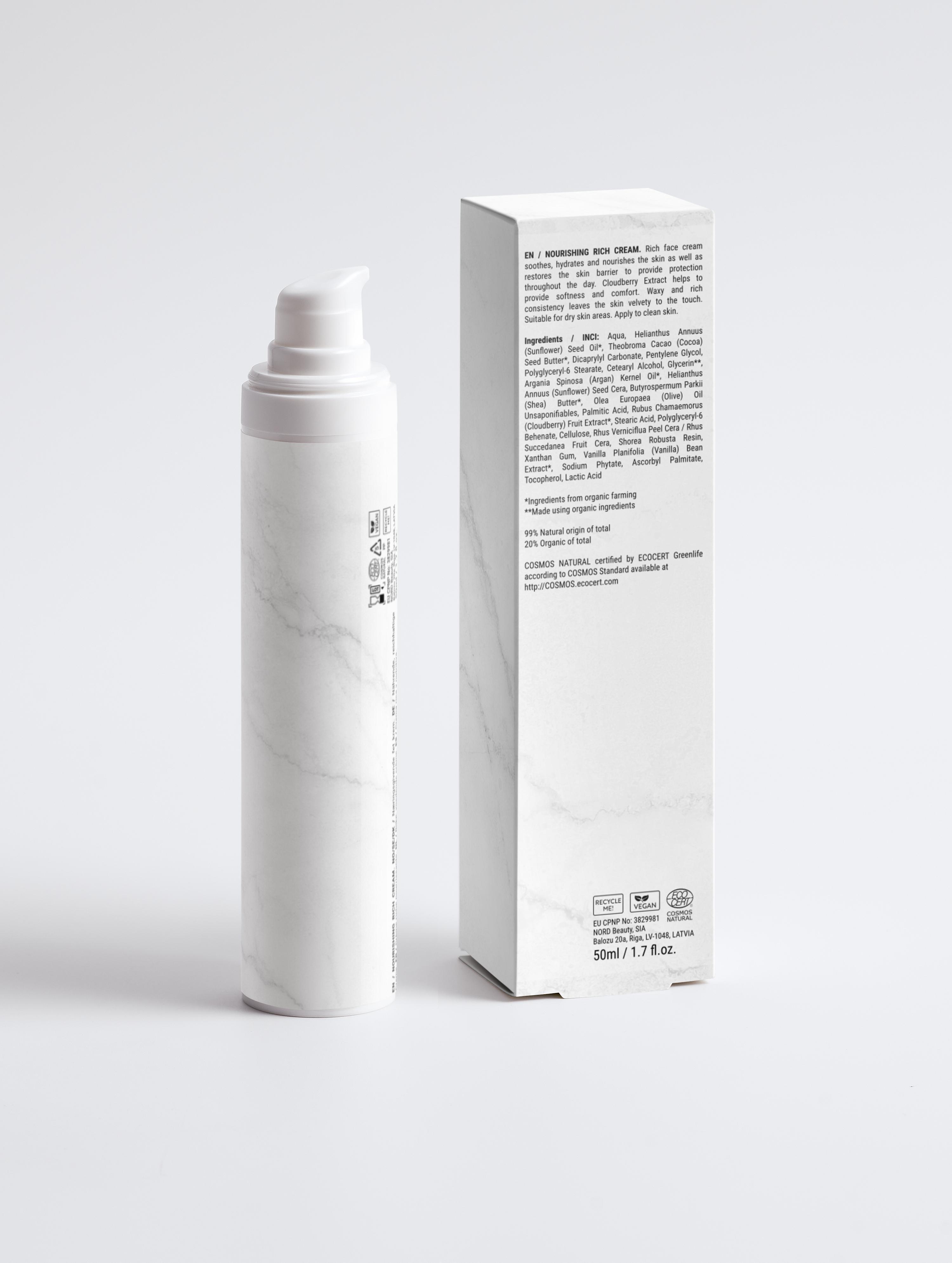 Eclat Soin Nourishing Rich Face Cream with a sleek white dispenser and textured packaging for hydration